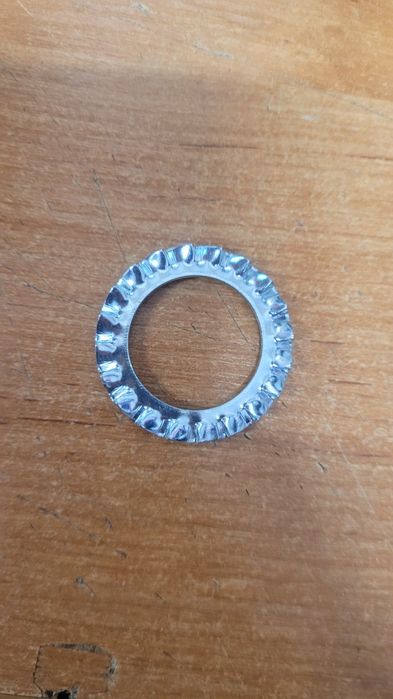 Podkładka koronkowa fi24 (25) DIN 6798A