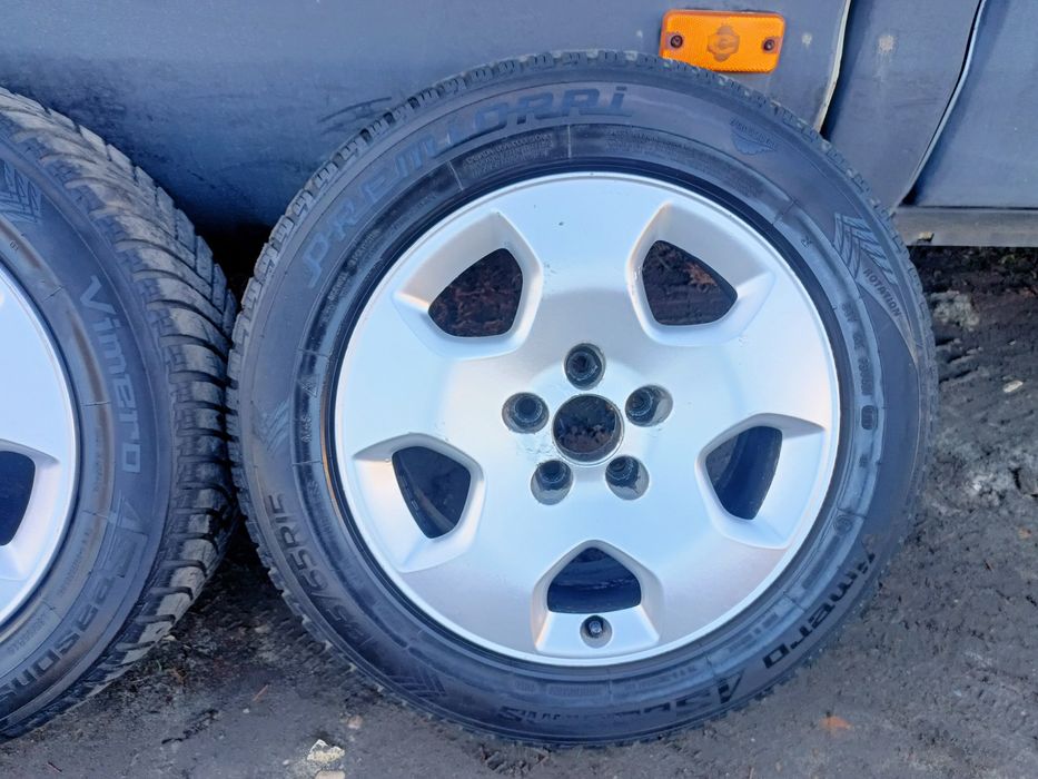 Felgi z oponami 185/65R15 wielosezon 24r Audi 5x100 A1 A2 A3 chrysler