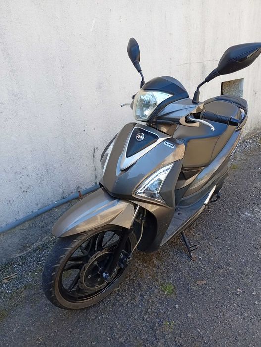 Moto 125 bem estimada troco por carro Ismart do mesmo valor..