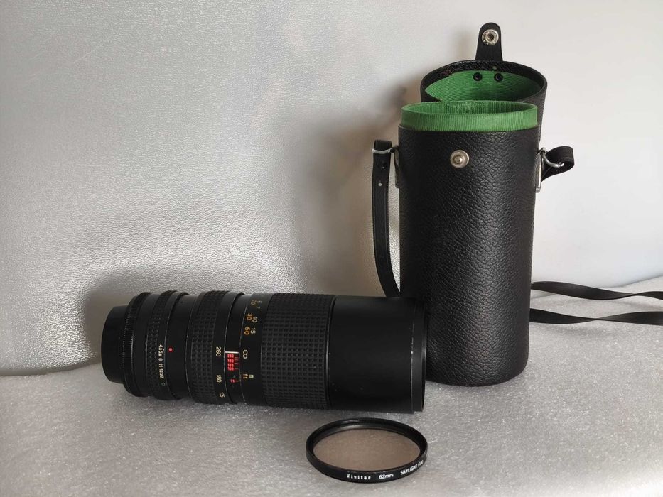 lente Tokina RMC 70–260mm f/4.5 FD lente zoom + bolsa + filtro Vivitar
