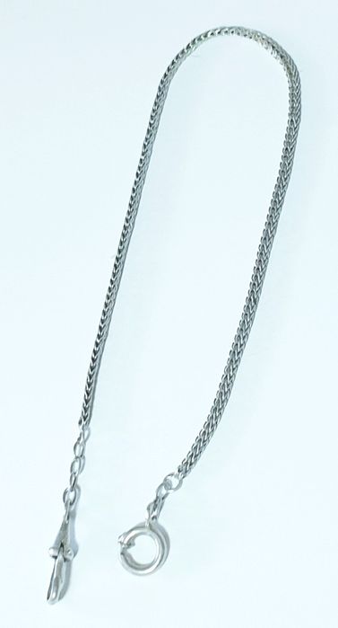 Antigo corrente de relógio de bolso em prata contrastada