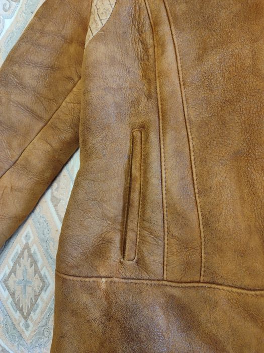 Тепла дублянка на овчині