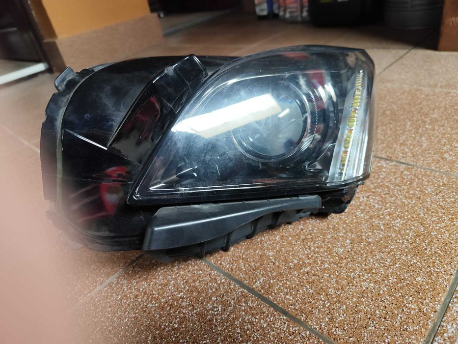 Cadillac CTS 2014- reflektor lewy europa