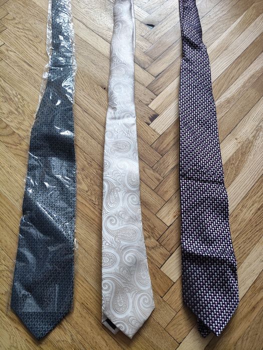 Краватки чоловічі нові.