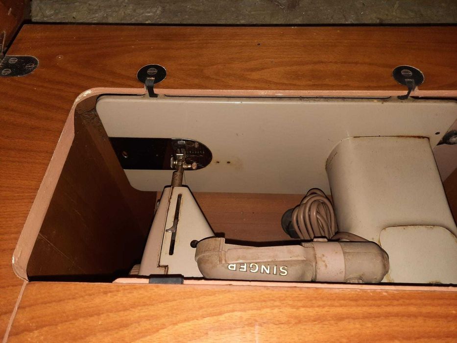 Máquina de costura singer