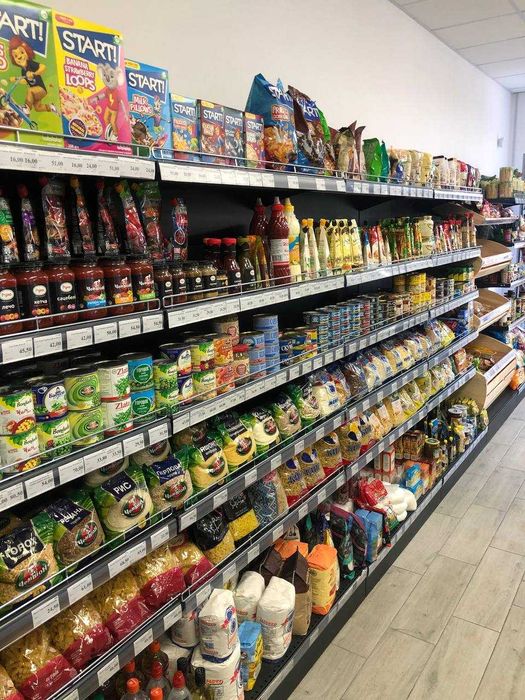 Магазин під ключ (стелажі, холодильники, прикасові зони)