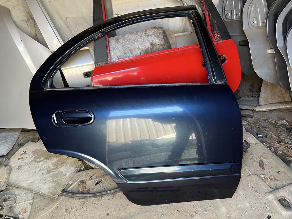 Дверь задняя правая Almera Classic b10