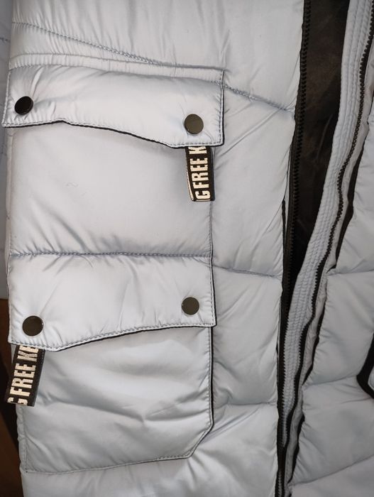 Пуховик зимовий новий