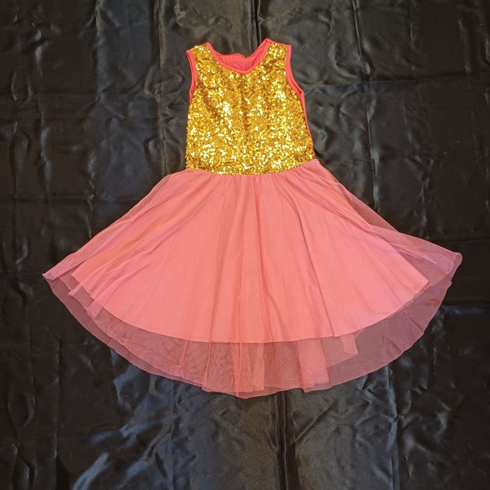 Святкова сукня на дівчинку в золотих паєтках