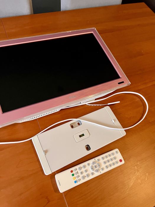 Televisao TCL rosa com comando + suporte parede64171282723074121