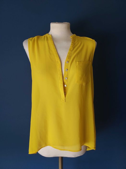 Top túnica amarelo com botões em madrepérola