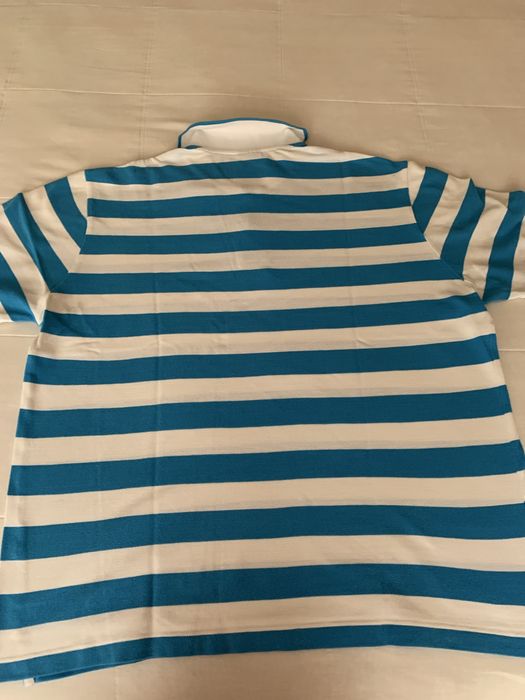 Polo Decenio azul e branco original