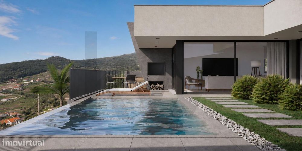 Moradia T3 Térrea de Arquitetura Contemporânea com Piscina Infinita e