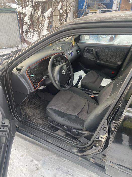 Нісан примʼєра р11