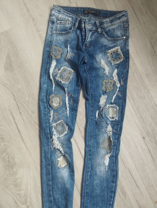 Damskie spodnie jeansowe