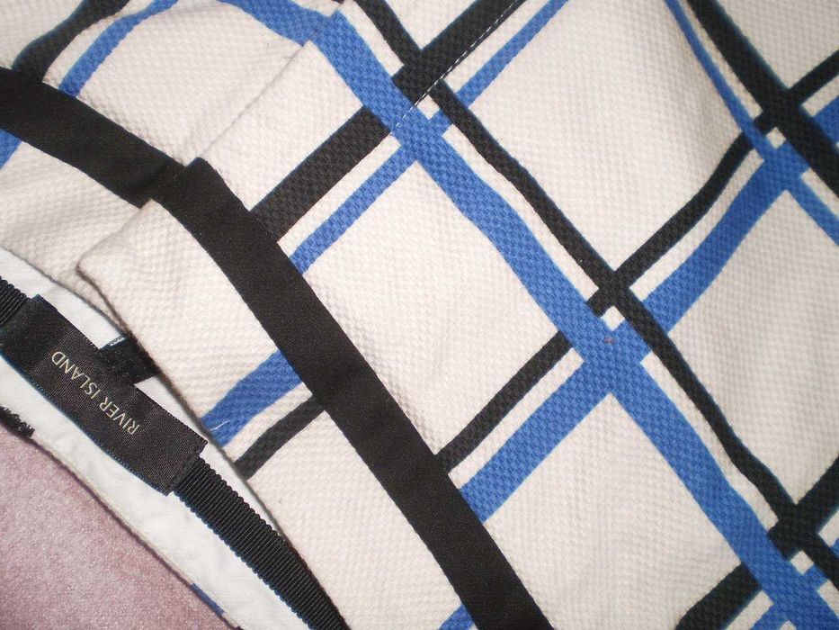 bawełniane spodnie w kratę