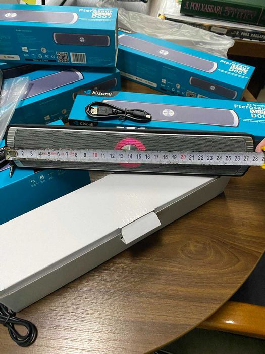 Колонка портативна Kisonli з радіо,  підсвіткою та Bluetooth нова