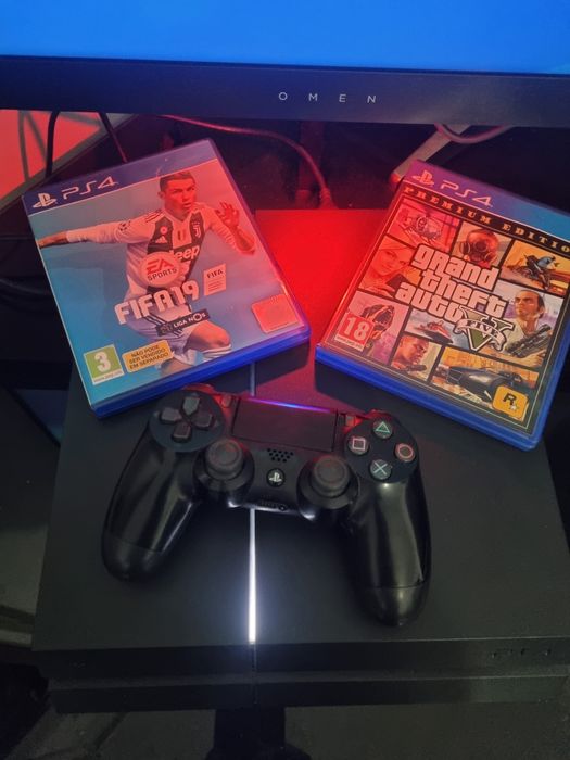 Ps4  +  2 jogos + comando  + base de carregamento