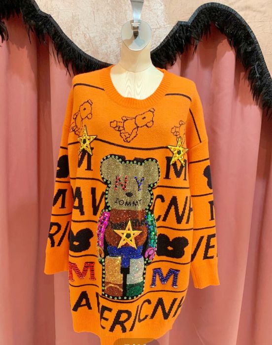 Подовжений яскравий светр