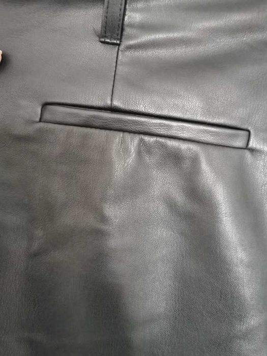 Calções pretos em ecopele para rapariga