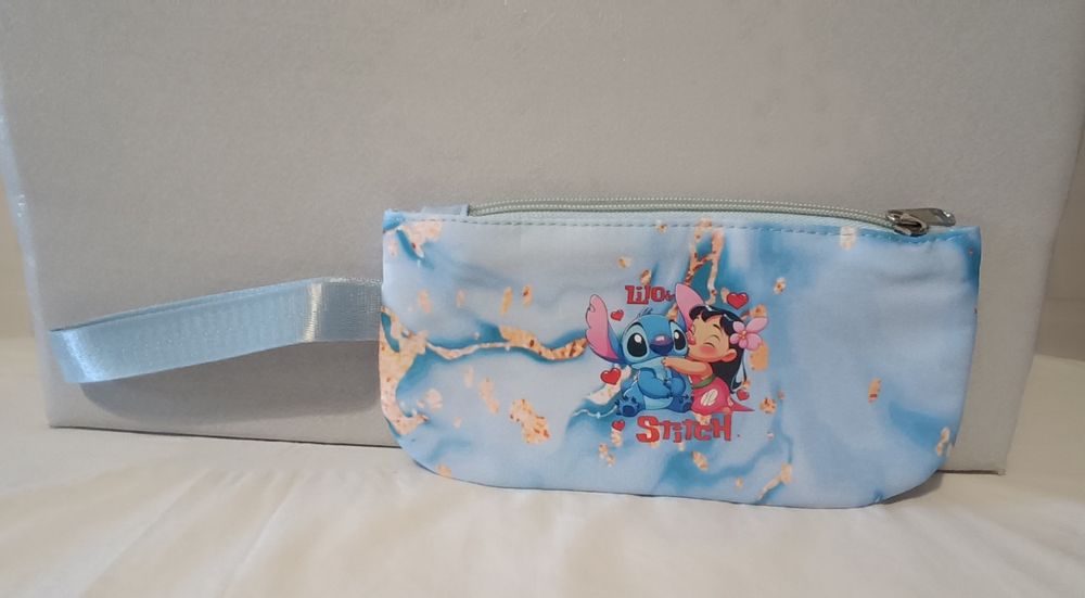 Conjunto Lilo & Stitch. Lara. Mochila  e  estojo.