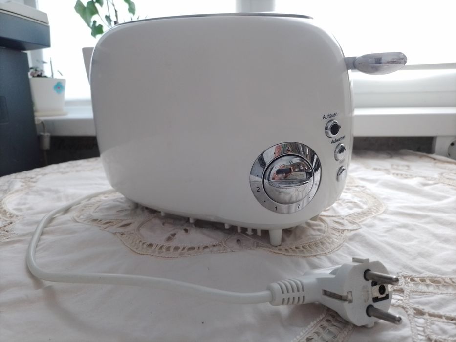 Тостер  с функцией размораживания