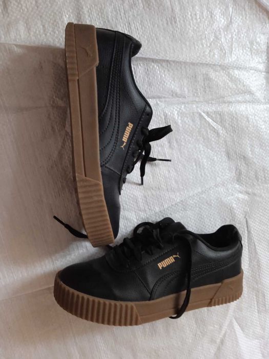 продам чорні жіночі шкіряні кросівки Пума практично нові