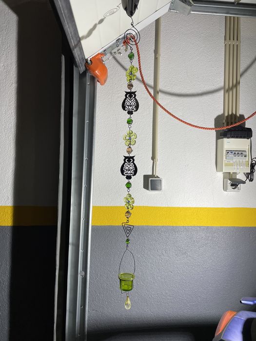 Porta vela pendente com mochos em ferro