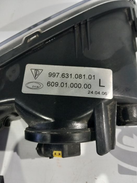 Farol de nevoeiro esquerdo Porsche 911 (997)