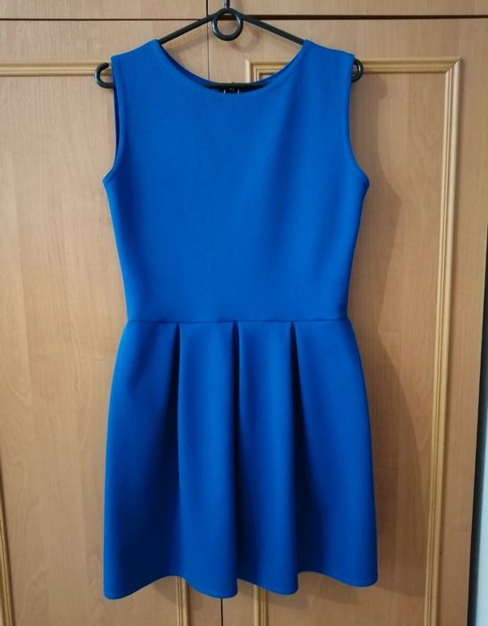 Elegancka sukienka niebieska ze złotym zamkiem S/M