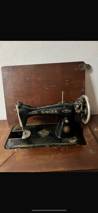 Máquina de costura singer