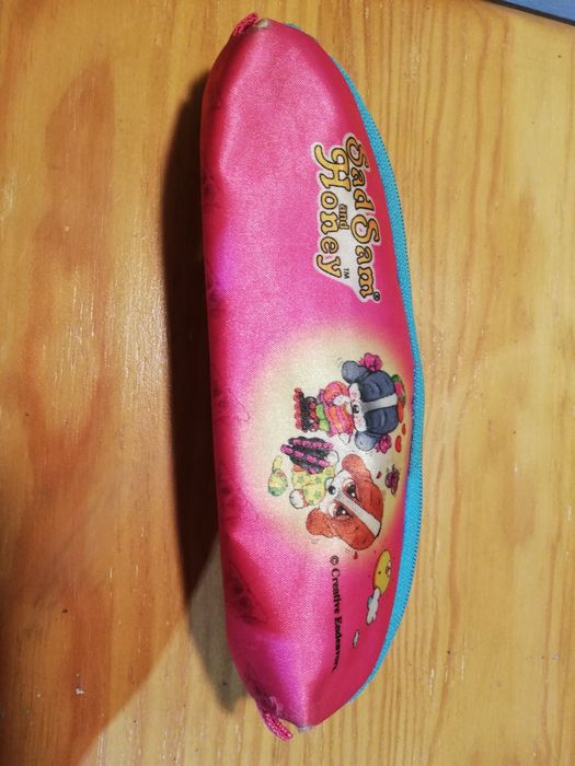 Estojo SadSam and Honey cor de rosa e azul