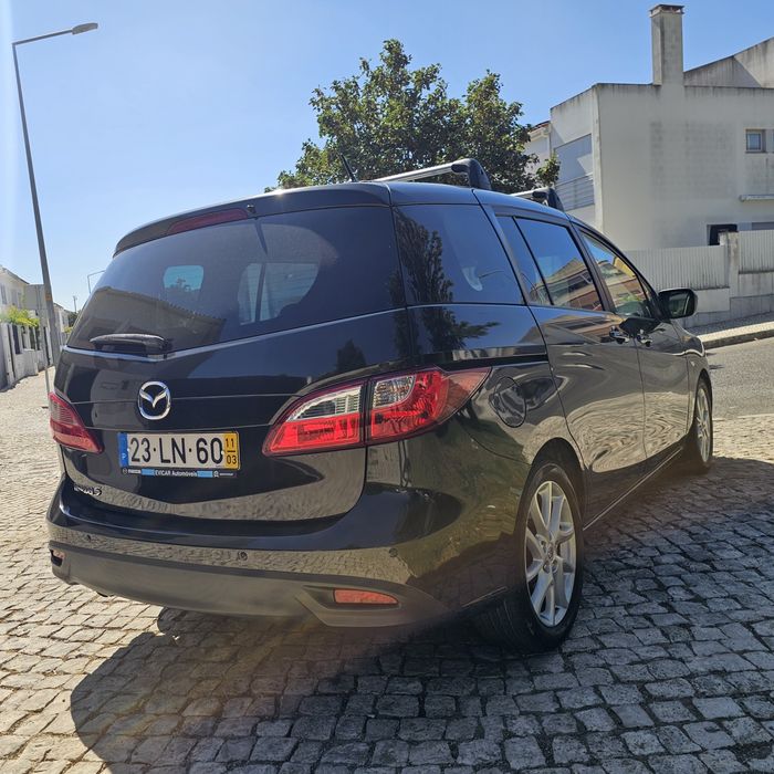Vendo masda 5 de 2011 de 7 lugares com apenas 163 mil km esta rigorosamente impecável