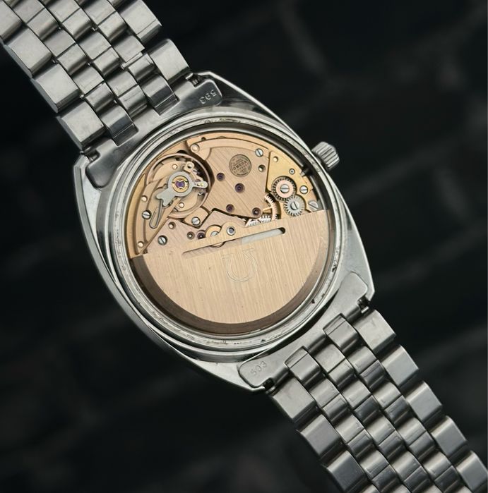 OMEGA  Constellation c-shaped Cal. 1021.  Gerald Genta White Gold Bezel