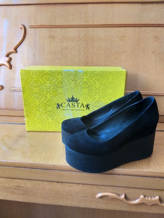 Шкіряні туфлі на високій платформі