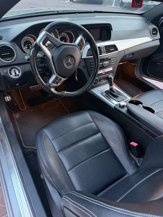 Mercedes-Benz C-Class 2014 VIN WDDGJ4HB2FG371207 фото оголошення 6 з 15