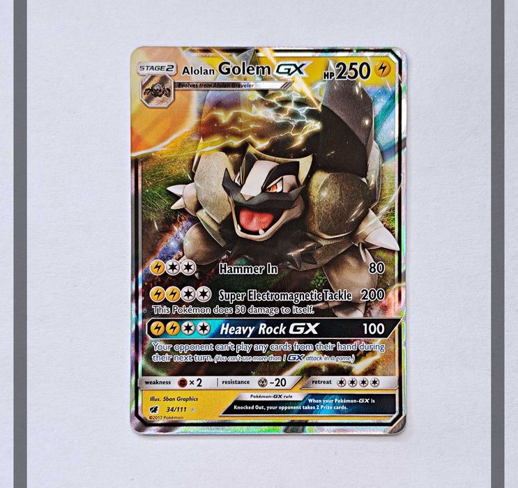 Alolan Golem Gx 34/111 CIN Pokemon ENG-NM