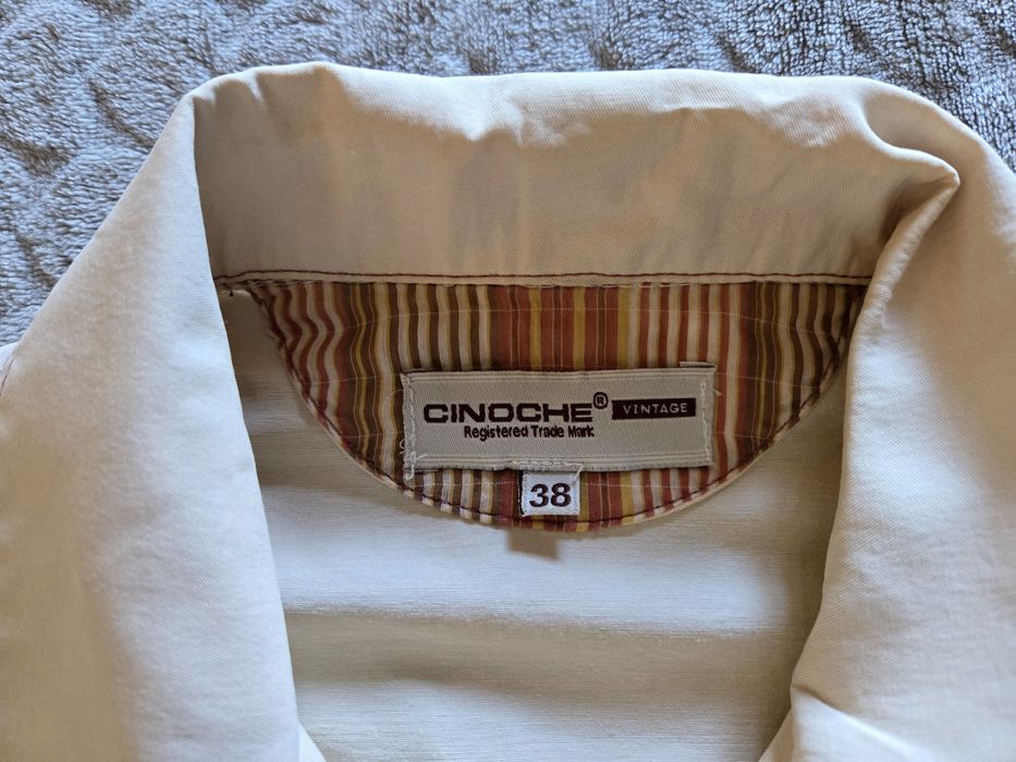 Conjunto de jaqueta e calças com padrão floral