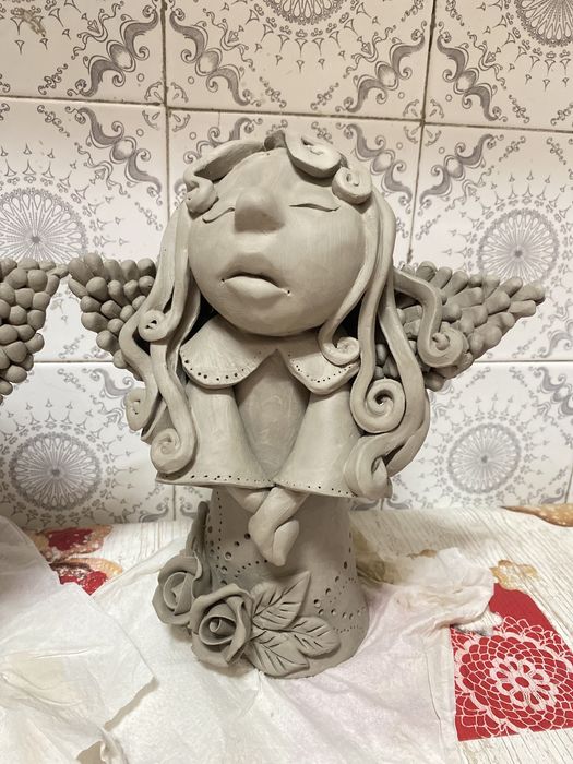Anjos de ceramica