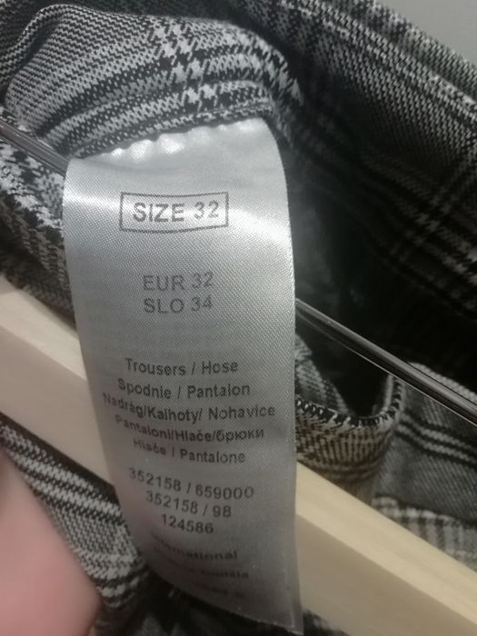 Spodnie w kratkę Orsay 34