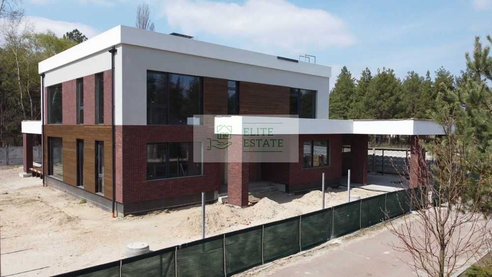 Продаж сучасного будинку 300 м² + 39 соток в сосновому лісі