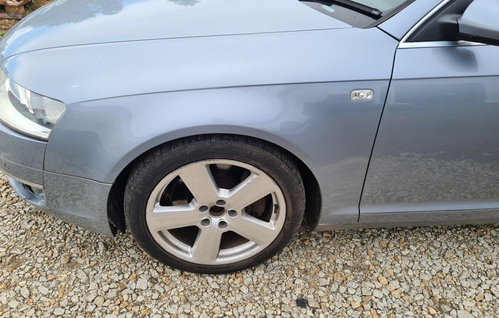 LEWY BŁOTNIK przedni Audi A6 C6 2005r LY7J