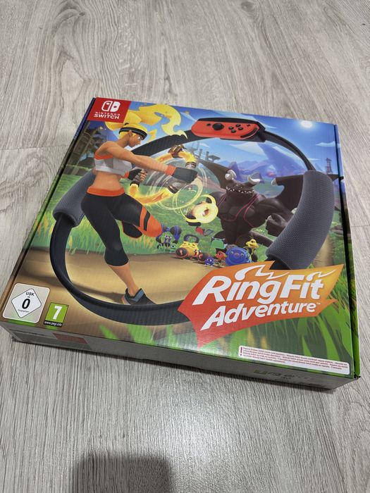 Nintendo Switch OLED + gry + Ring Fit Adventure + etui