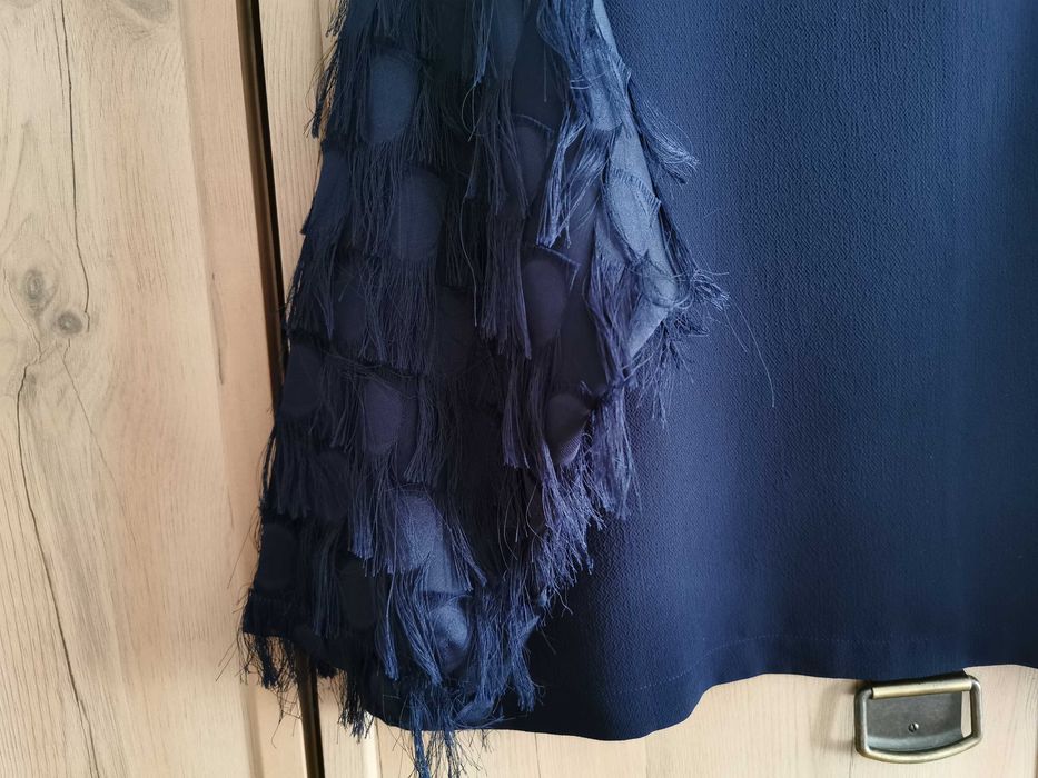 Bluzka H&M z pierzastymi rękawami