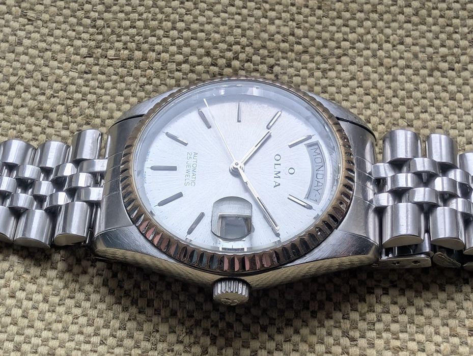 Швейцарские часы  Olma