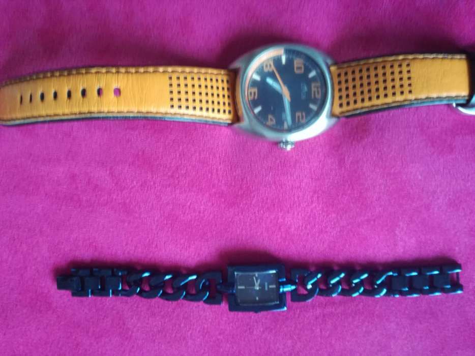 Relógios Guess e Lotus