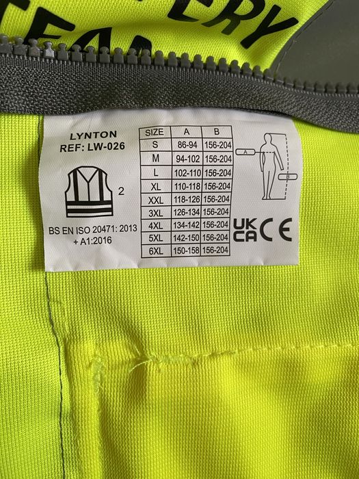 Жилетка сигнальна.