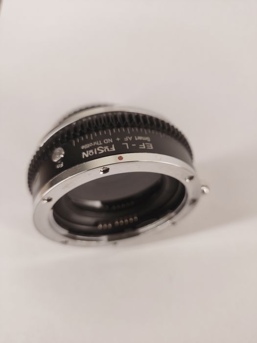 Adapter Fotodiox Pro EF - L mount, z wbudowanym  zmiennym filtrem ND, przeniesienie elektroniki