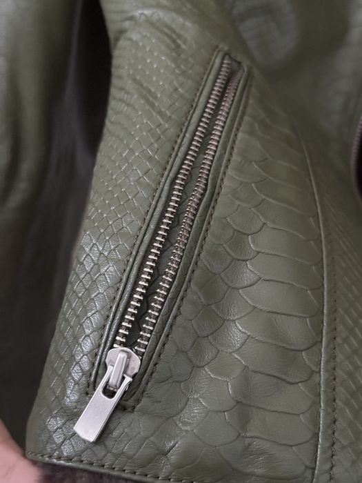 Жіноча шкіряна куртка (натуральне хутро)