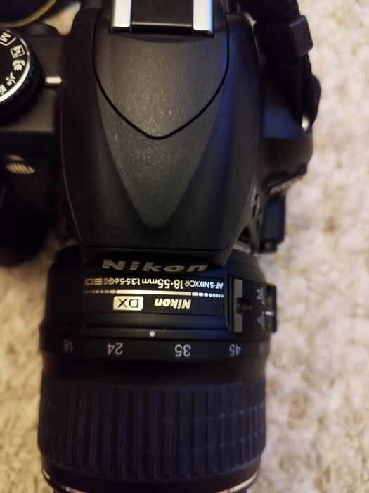 Nikon D3100 + lente extra